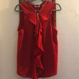Red blouse in the size 2x.